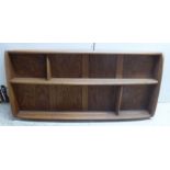 An Ercol elm two tier hanging plate rack 19''h 42''w BSR