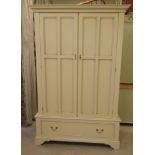 A Laura Ashley Clifton cream painted wardrobe with a pair of panelled doors,