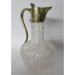 A late Victorian cut crystal claret jug with a silver collar and lid Birmingham 1900 U