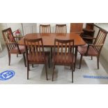 A G-Plan teak dining table, the top with rounded corners,