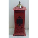 A Victorian style, red painted,