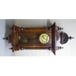 A late 19thC walnut cased Vienna regulator;