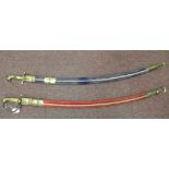 Two similar 20thC Indian sabres with brass birds' head pommels and knuckle guards,