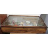 An early 20thC retailer's mahogany tabletop display cabinet with a fully glazed,