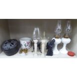 A mixed lot: to include a pair of Edwardian milk glass oil lamps 10''h;