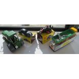 A Triang tinplate and plastic model clockwork road roller;