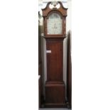 A late 18th/early 19thC oak longcase clock, the hood with a swan neck pediment and a waisted trunk,