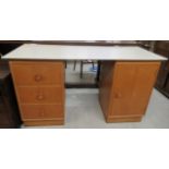 A mid 20thC Meredew part white painted oak twin pedestal desk 27''h 48''w BSR
