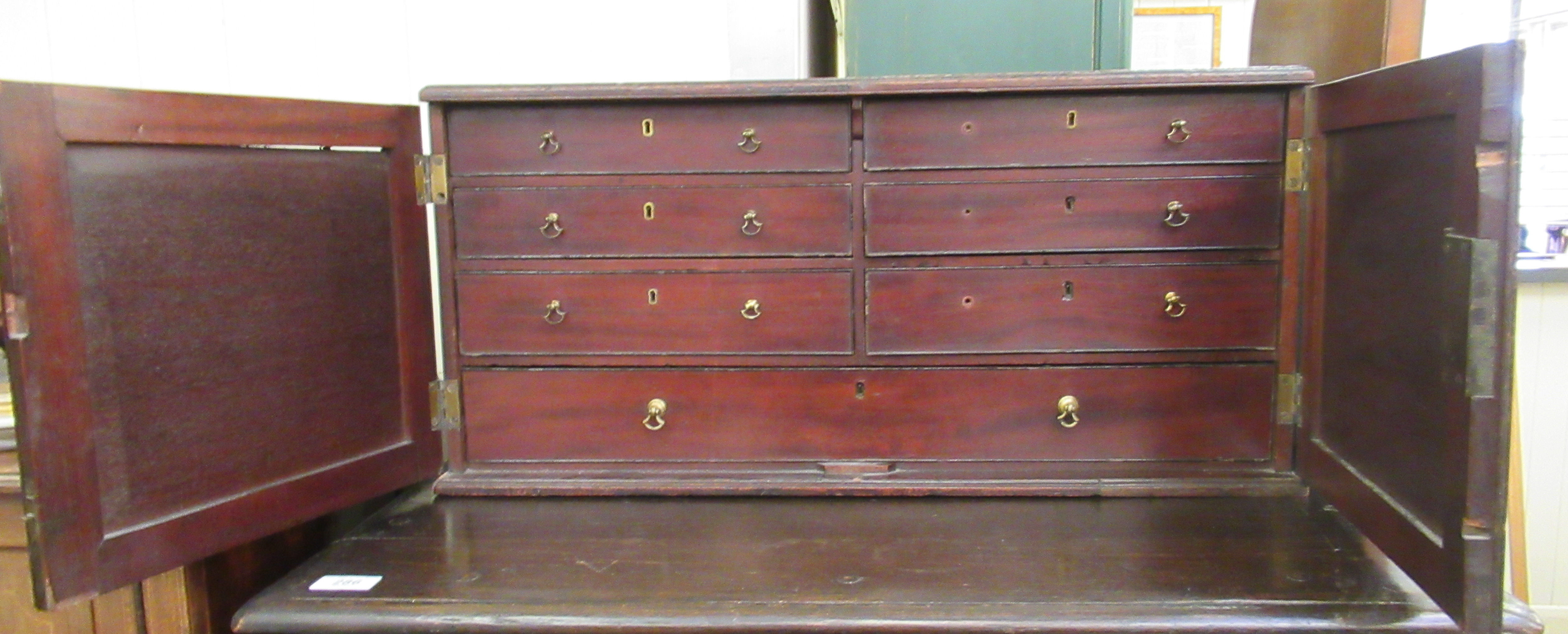 A mid 19thC mahogany tabletop collector's cabinet,