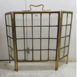 A mid 20thC lead glazed and brass framed triptych firescreen 26''h 32''w (open) SR