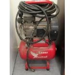 A GM 260 compressor, in a red painted,