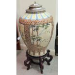 A 20thC Oriental china baluster shaped vase and electroplated cover,
