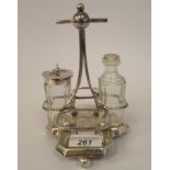 In the manner of Dresser, a late Victorian Walker & Hall silver plated cruet,