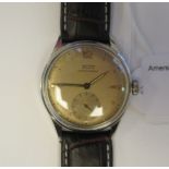 A 1947 Tissot Antimagnetique 27-13 stainless steel cased wristwatch, faced by an Arabic dial,