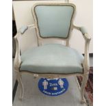 A modern French blue wash painted French inspired armchair with stud upholstered arms and a
