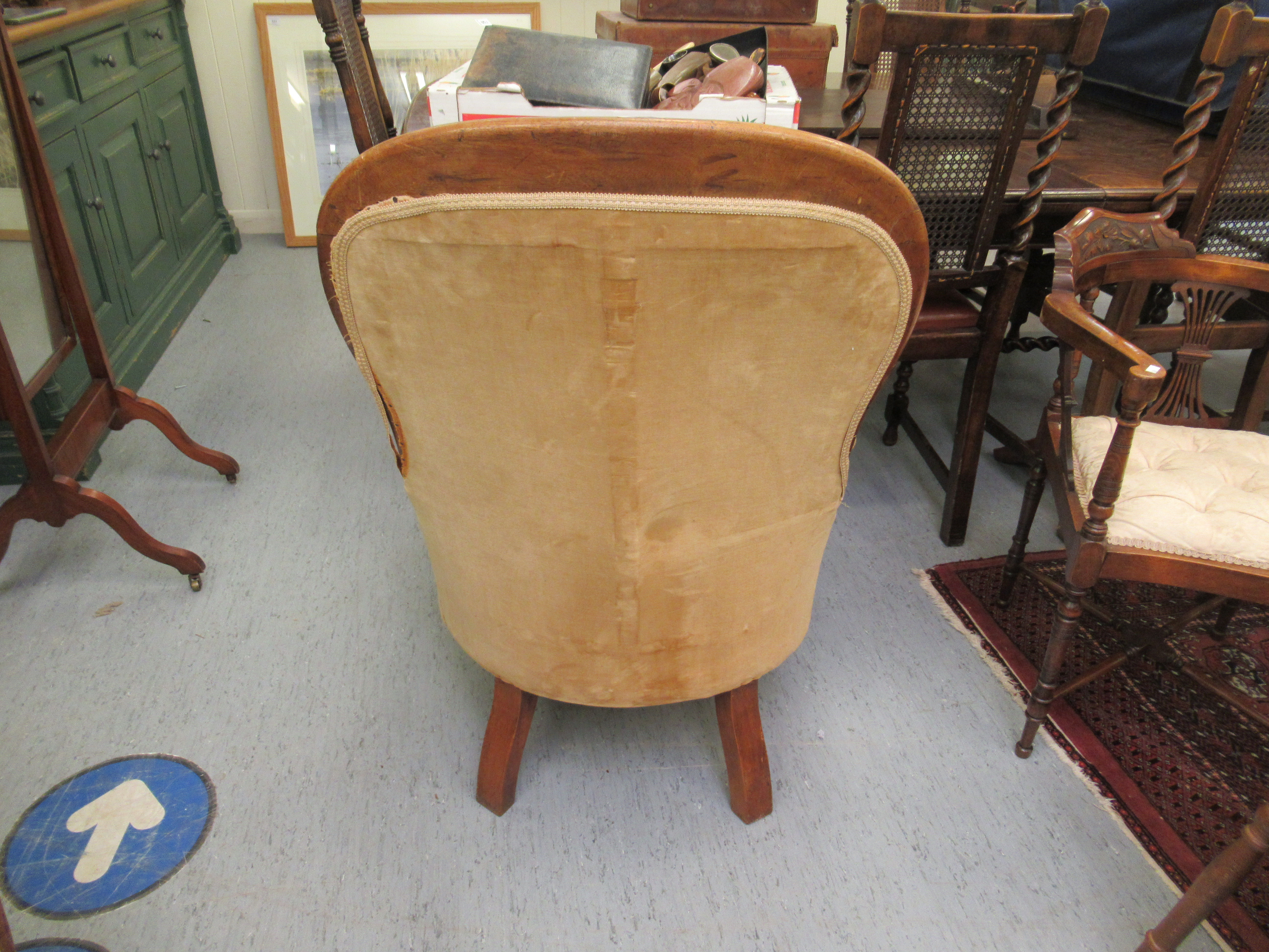 A late Victorian mahogany spoonback nursing chair, button upholstered in gold coloured fabric, - Image 3 of 3