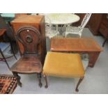 Small furniture: to include a mid 20thC tri-panelled oak chest with straight sides and a hinged lid