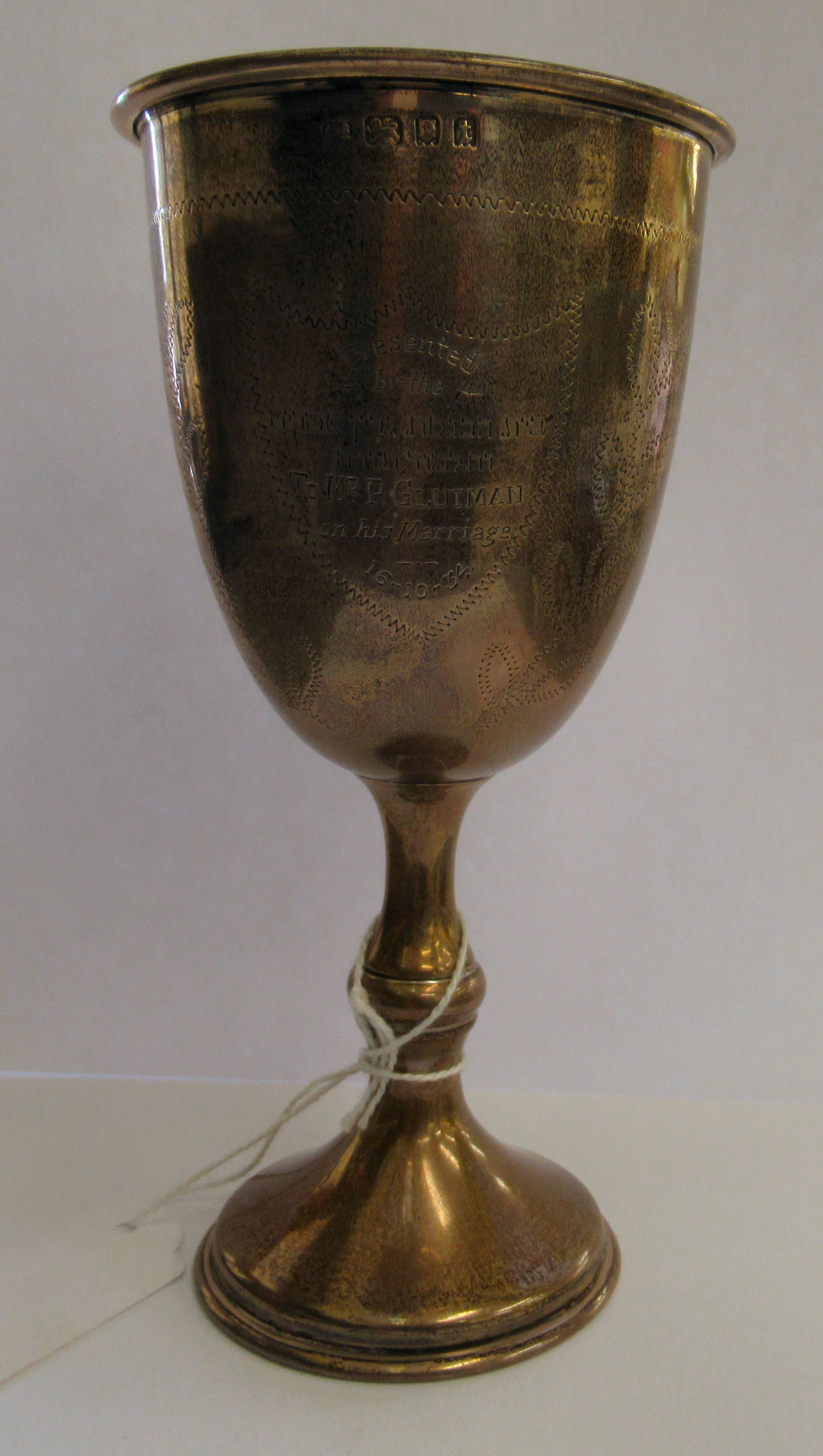 A silver pedestal cup, presented to Mr P Glutman on his Marriage 16.10.