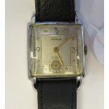 A 1947 Nimo (Girard-Perregaux) square, stainless steel cased wristwatch, faced by an Arabic dial,