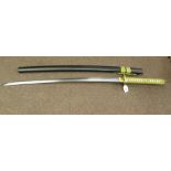 A Japanese style katana or similar sword,