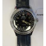 A 1950s Oris stainless steel cased calendar wristwatch,