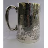 A late Victorian silver Christening tankard of tapered form with a hollow loop handle,