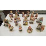 Approx. 20 Hummel and Goebel china figures: to include 'Prayer before Battle' a boy with a rifle 4.