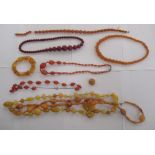 Amber and amber coloured bead necklaces and bracelets OS10