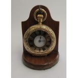 A lady's 18ct gold cased half-hunter fob watch with bright cut and engine turned ornament,