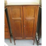 An Edwardian string inlaid and crossbanded mahogany standing cupboard,