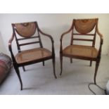 Two similar Regency style Continental inspired mahogany framed open arm chair,