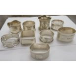 Nine silver and white metal napkin rings mixed marks OS10