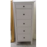 A modern white painted five drawer pedestal dressing chest, raised on block feet 51''h 22.
