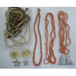 Items of personal ornament: to include two pink coral necklaces 11