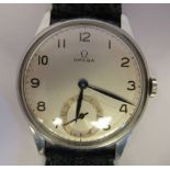 A 1950s Omega stainless steel cased wristwatch, faced by an Arabic dial with subsidiary seconds,