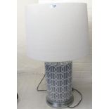A modern porcelain table lamp of cylindrical form,