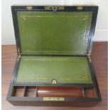 A mid 19thC mahogany writing slope with straight sides and a hinged lid,