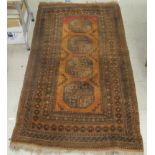 A Bokhara rug with elephant foot motifs,