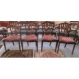 A set of four modern Georgian style mahogany framed, shield back dining chairs,