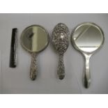 Four silver backed dressing table items mixed marks OS10