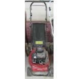 A Briggs & Stratton Master cut CJ16P Warrior petrol driven lawnmower with a 15''dia cut and grass