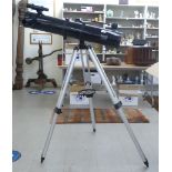 A Bausch & Lomb professional series reflecting telescope, on tripod with loose attachments approx.