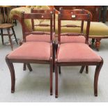 A set of four modern Regency style mahogany framed, bar and carved ropetwist back dining chairs,