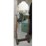 An Art Deco floorstanding dressing mirror, the shaped,