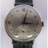 A 1940s Omega stainless steel cased wristwatch, faced by an Arabic and baton dial,