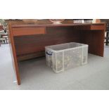 A modern teak home/office desk with two hanging flank drawers and a modesty panel 29''h 69''w