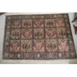 A part woollen/part silk Persian rug,
