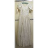 A 1990 Joel Peters style ivory coloured silk style wedding dress size 12 RSB