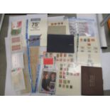 Five albums containing used/unused GB and other world issue postage stamps and presentation coin