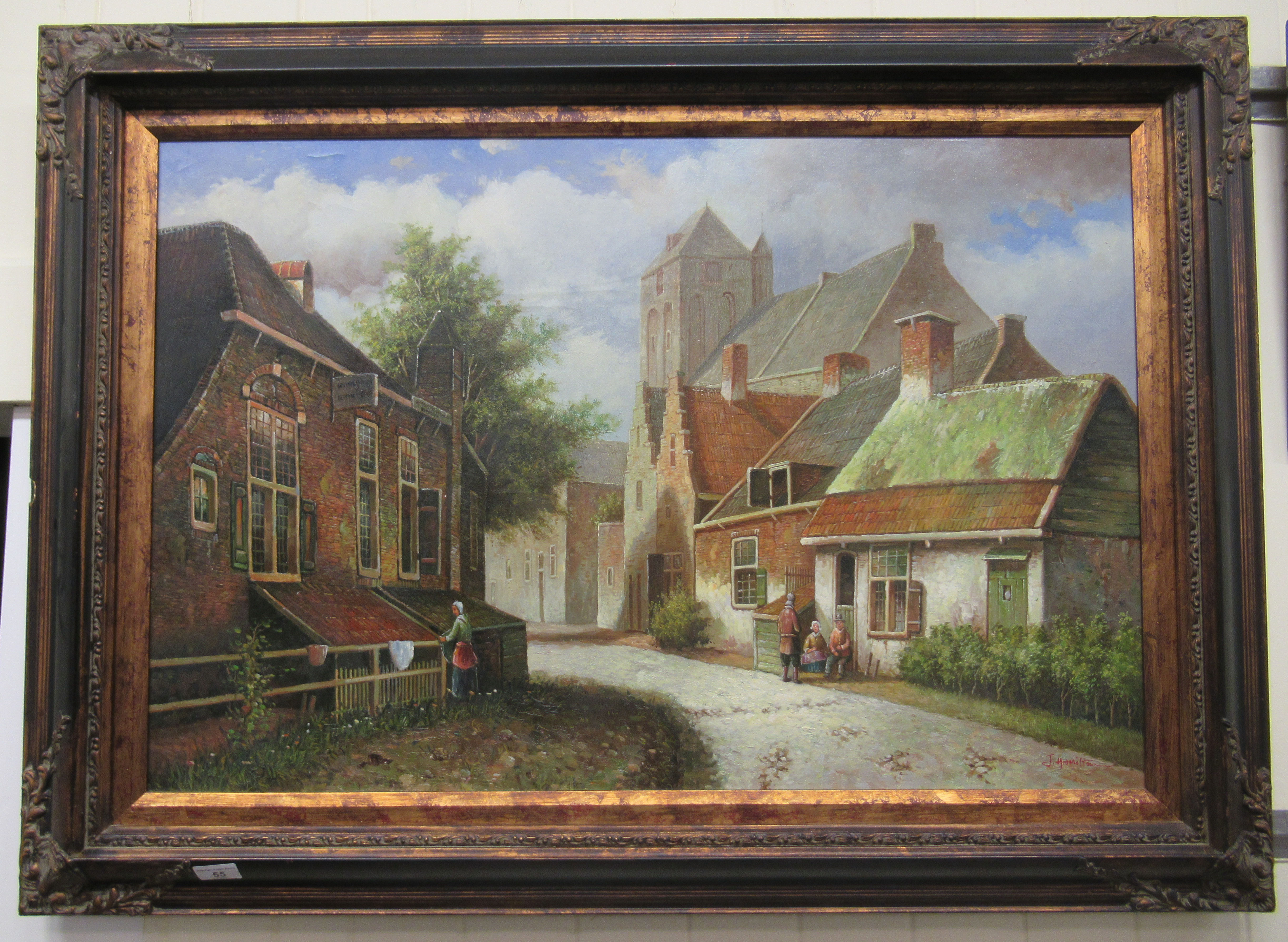 J Hamilton - a European village scene oil on canvas bears a signature 35'' x 22'' framed